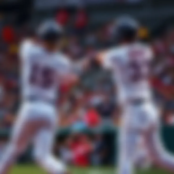 Two baseball players hitting home runs during a game