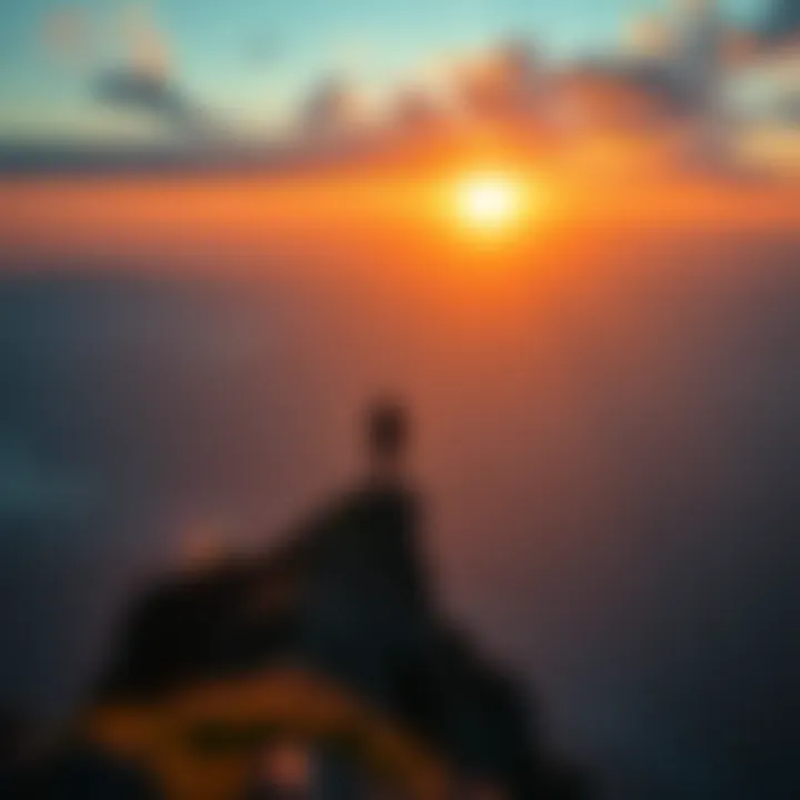 Dreams becoming reality A person standing on a mountain peak looking at a sunrise, symbolizing the realization of dreams and aspirations.