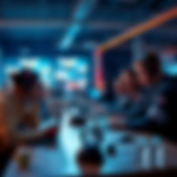A group of people discussing esports betting tips and strategies at a table with laptops and gaming gear