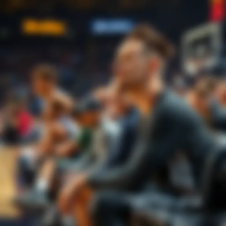 Lamelo Ball sitting on the bench looking concerned after being suspended for the fourth quarter