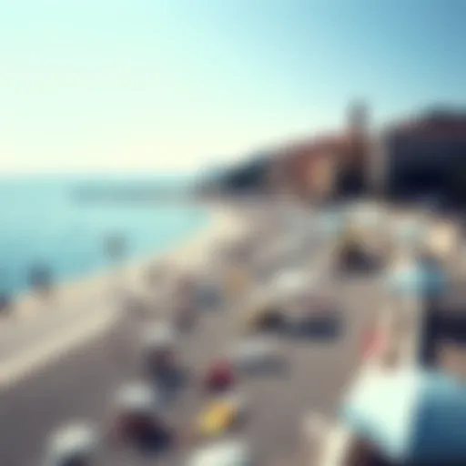 Sunny beach in Nice with people enjoying the sun and the sea
