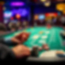 A player focused on a live blackjack game with cards and chips on the table, showing a strategic approach to gameplay.
