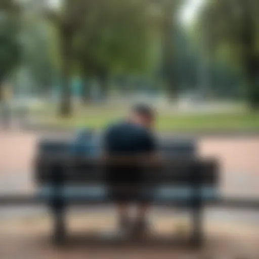 Person feeling lost A person sitting alone on a bench looking down, surrounded by a park setting, reflecting on their thoughts and feelings of failure.