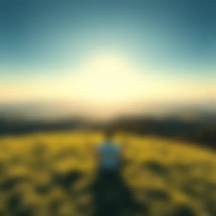 A person sitting cross-legged on a grassy hill, meditating with closed eyes under a clear sky, symbolizing inner peace and emotional healing.