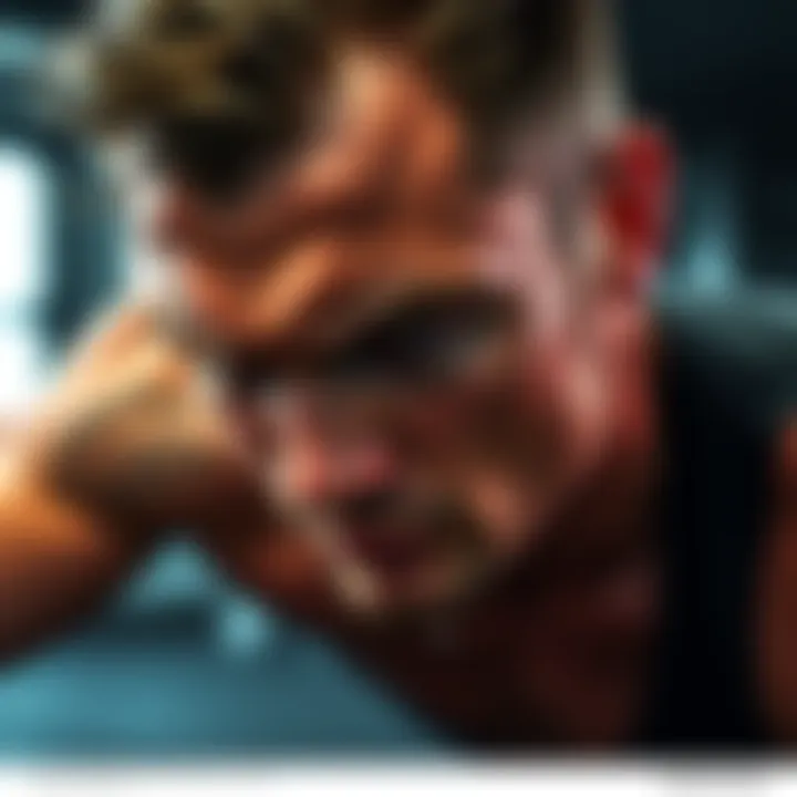 A person exercising intensely, showing sweat on their forehead, highlighting effort during a workout