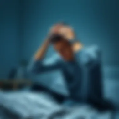 A person sitting on a bed, holding their head in discomfort, showing signs of pain and emotional stress.