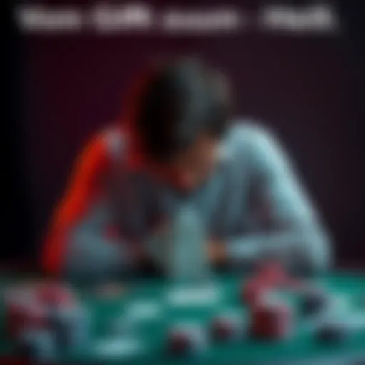 A person sitting alone at a table with their head in their hands, surrounded by playing cards and chips, representing the struggle with gambling addiction.